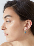 Blue London Hoop Charm pictured on model on the Elfin Huggies in first piercing. 