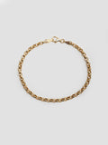 14kt Yellow Gold Rolo Chain Bracelet pictured on light grey background. 