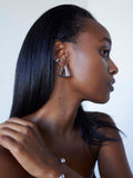 Sterling Silver Triangle Hoops pictured on model.