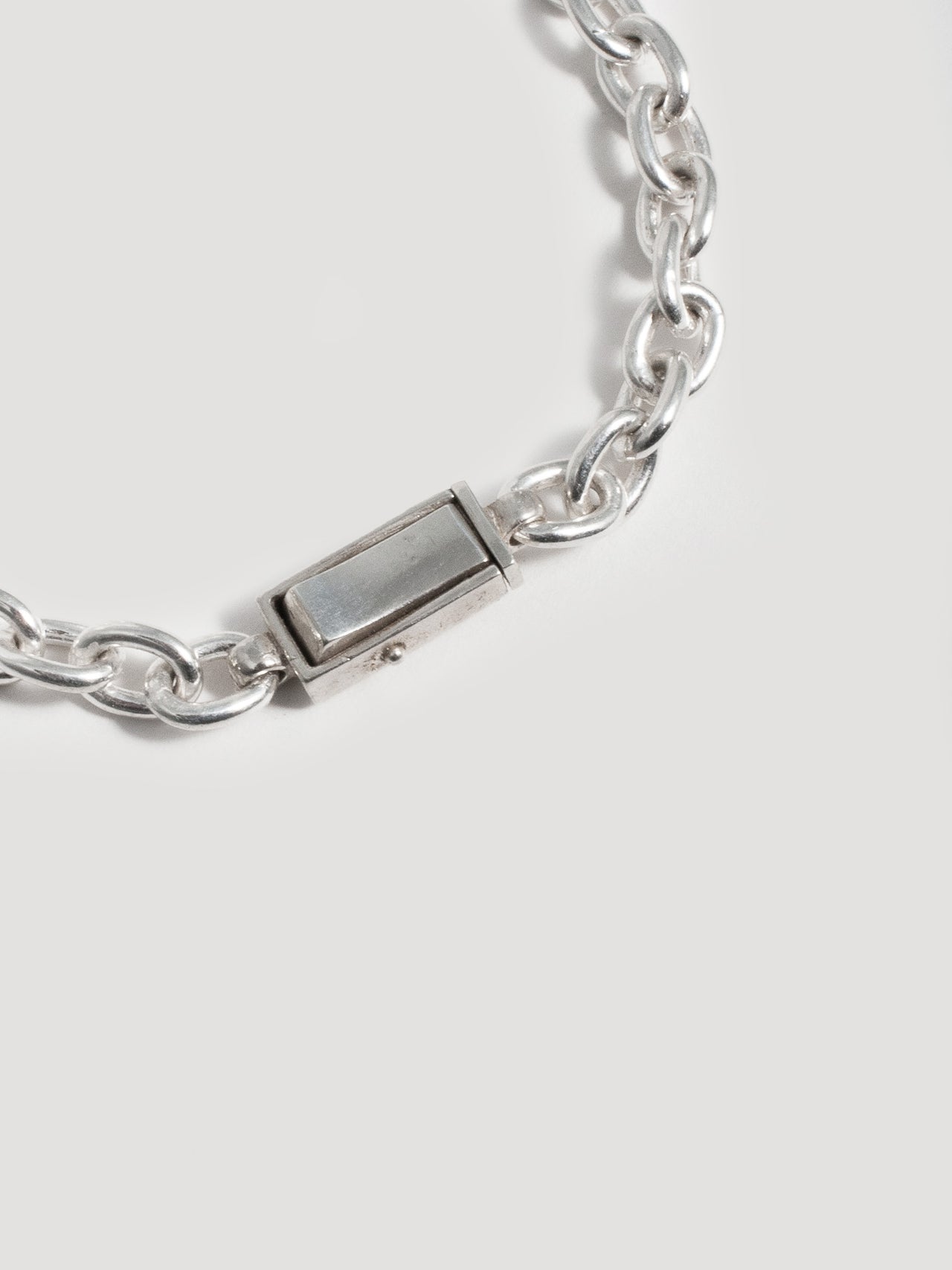 Close up shot of  Silver Box Lock Cable Bracelet.