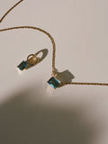 Blue London Hoop Charm pictured with the XL Gemstone Valentino Necklace. Flat lay image. 