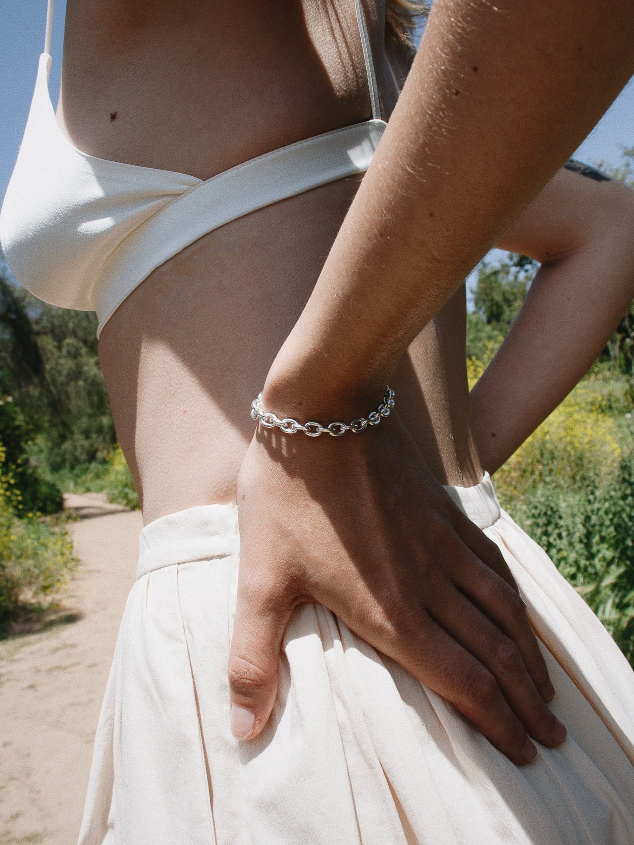  Silver Box Lock Cable Bracelet pictured on models wrist. 