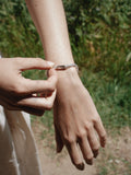  Silver Box Lock Cable Bracelet pictured on model with lock shown in the front 