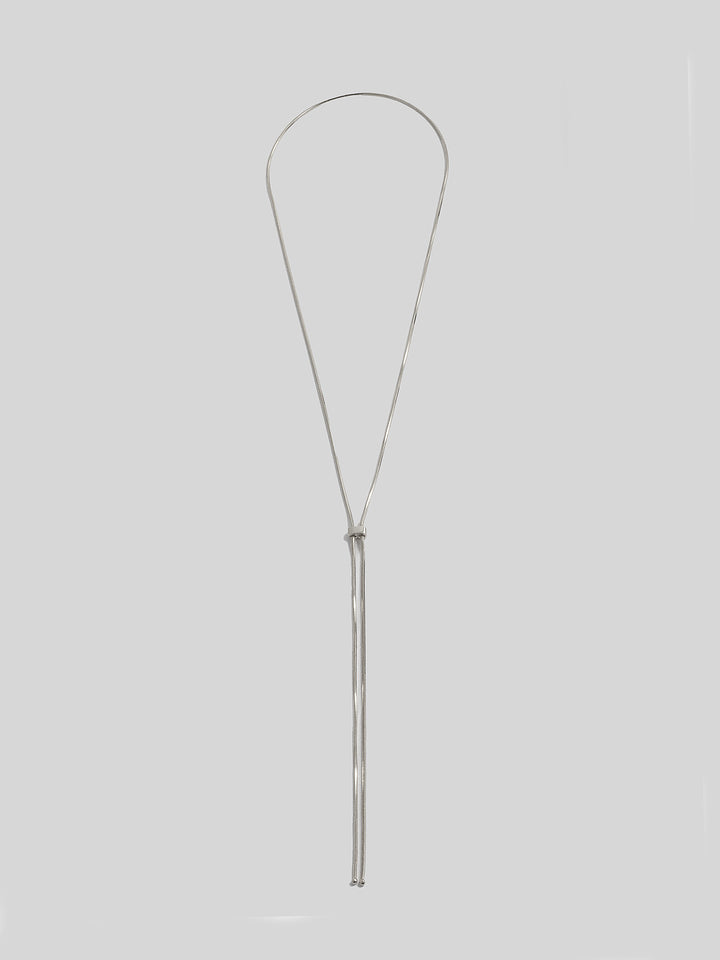 Sterling SIlver Bolo Pendant Necklace pictured on light grey background. 