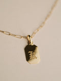 Octagonal ID Pendant engraved with K in Gothic Font.