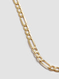 Close up shot of 14KT Yellow Gold Figaro Chain. Shot on light grey background. 