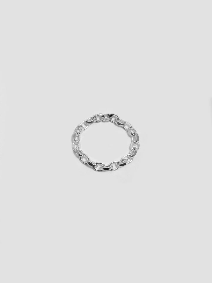 Sterling Silver Rolo Chain Ring pictured on light grey background. 