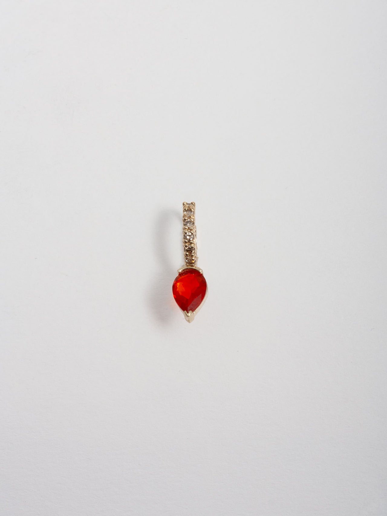 14kt Yellow Gold Diamond Gem Hoop pictured on light grey background. 