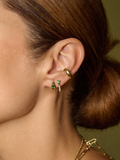 14kt Yellow Gold Mini Diamond Tsavorite Safety Pin pictured in models second piercing. 