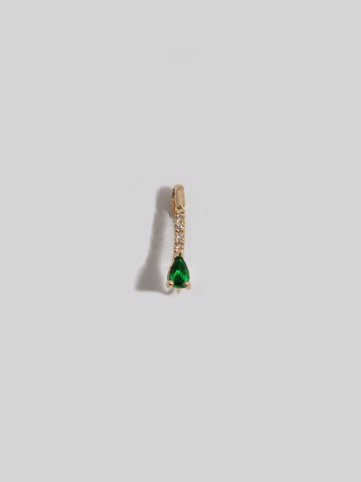 14kt Yellow Gold Mini Diamond Tsavorite Safety Pin pictured on white background.