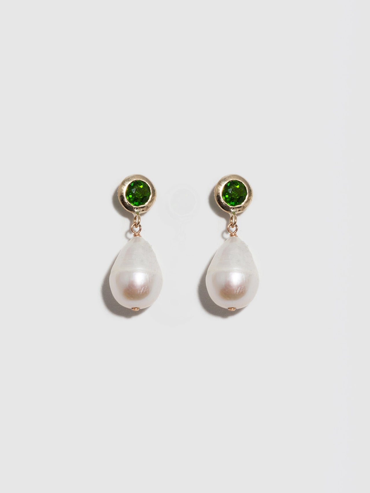 Tantra Pearl Link Earrings pictured on light grey background. 