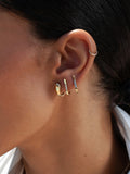 Diamond Long Rod Huggies pictured in models second piercing. 