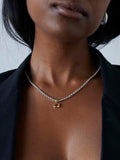 14kt Yellow Gold Citrina Medallion Pendant pictured on model. 