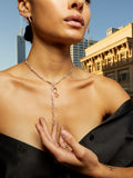 Sterling Silver Stone Teardrop Necklace pictured on model City in background. 