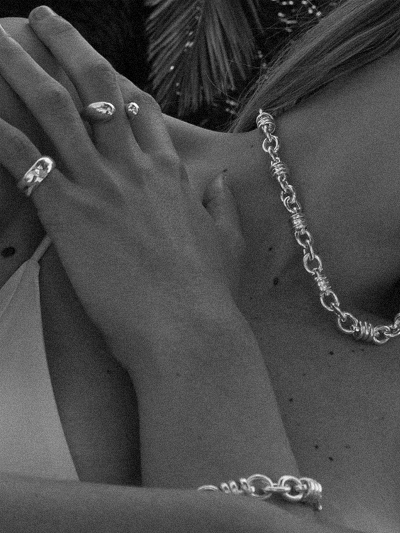 Sterling Silver Whorl Chain Necklace pictured on model. Black and white photo. 