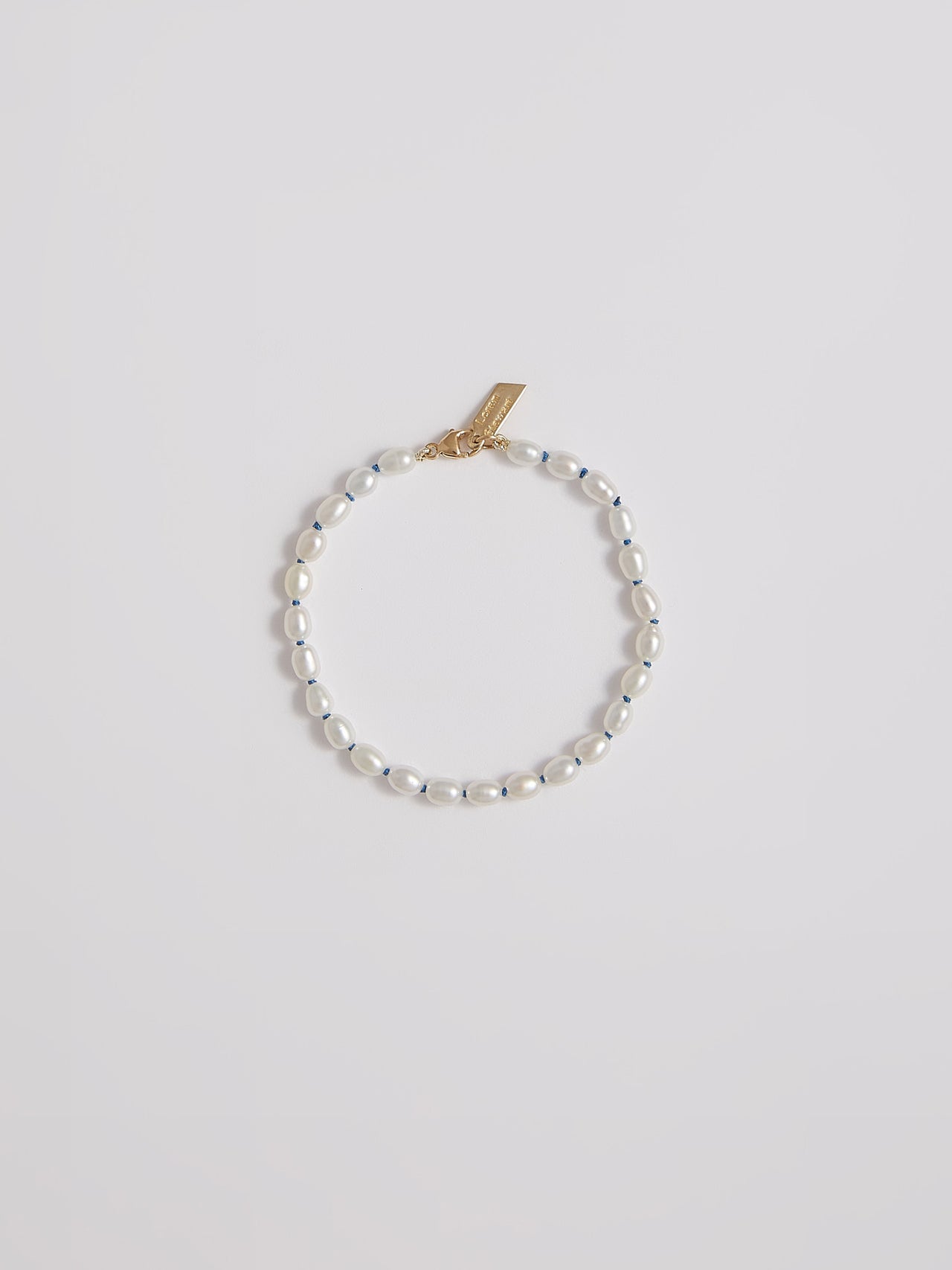 Delicate Bracelet With Freshwater Pearl and String 
