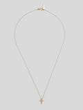 Product on image of thin yellow gold necklace with a small yellow gold mushroom pendant. 