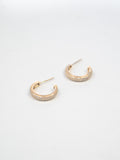 Product image of Theia Yellow Gold Pave Huggies shot on white background